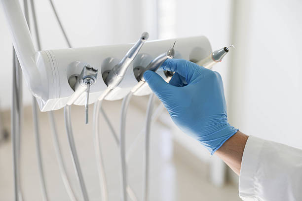 Professional Tooth Extraction technician working in Vaughn, WA